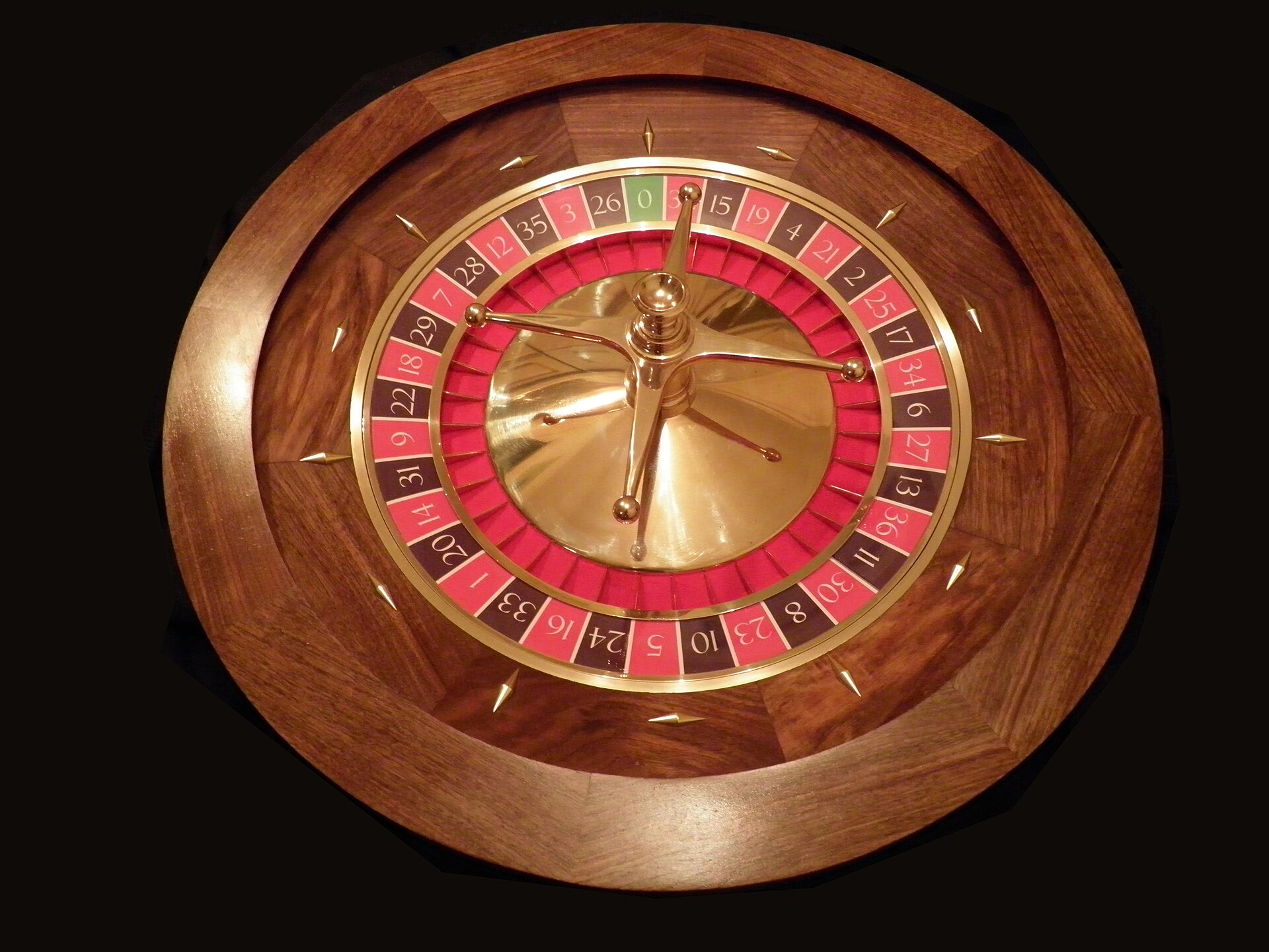 Roulette rouge et noire illustrant les risques liés aux casinos en ligne non autorisés